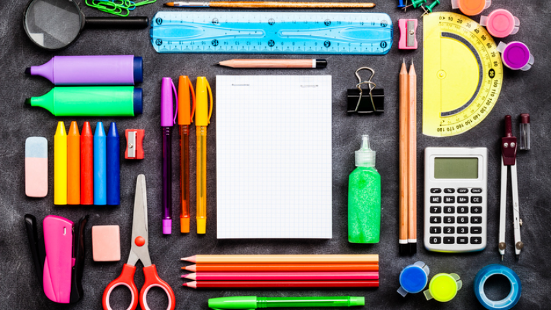 promotional picture for Burlington Library School Supplies Drive: featured assorted school supplies neatly aranged on a desk