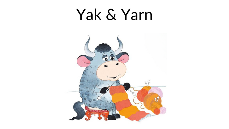 A Yak sitting on a stool knitting